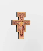 Cruz de madeira para parede são damião com adesivo brilhante, medindo 5,5x7,5cm. Leve e fácil de fixar, ideal para decoração religiosa e presente.